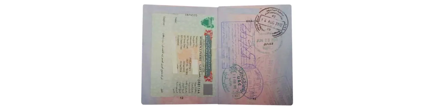 Bahrain residence permit sticker in a passport